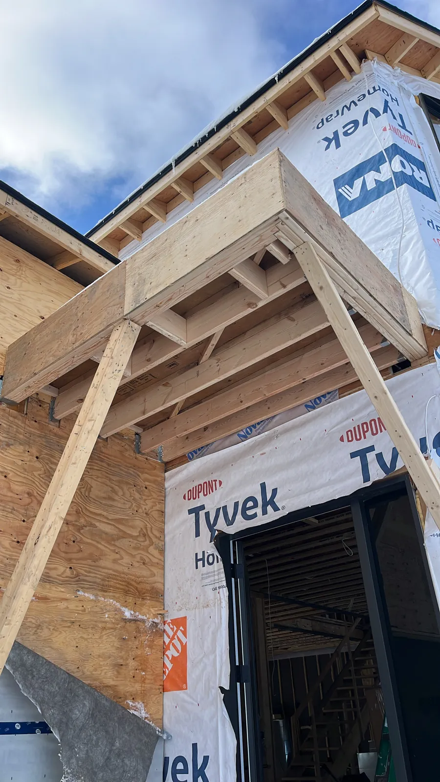 Entrance canopy framed over a doorway